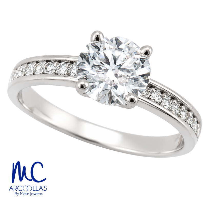 Anillo de compromiso de 1.06 ct · corte redondo brillante · color D · claridad VS1 · oro blanco 14k