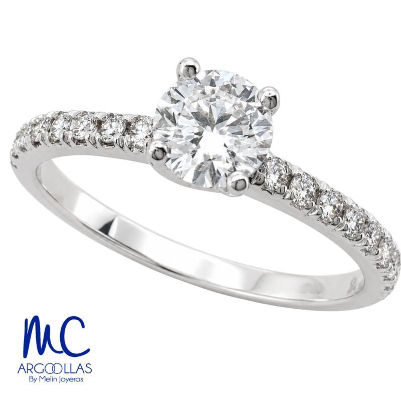 Anillo de compromiso de 0.62 ct · corte redondo brillante · color E · claridad VS1 · oro blanco 14k