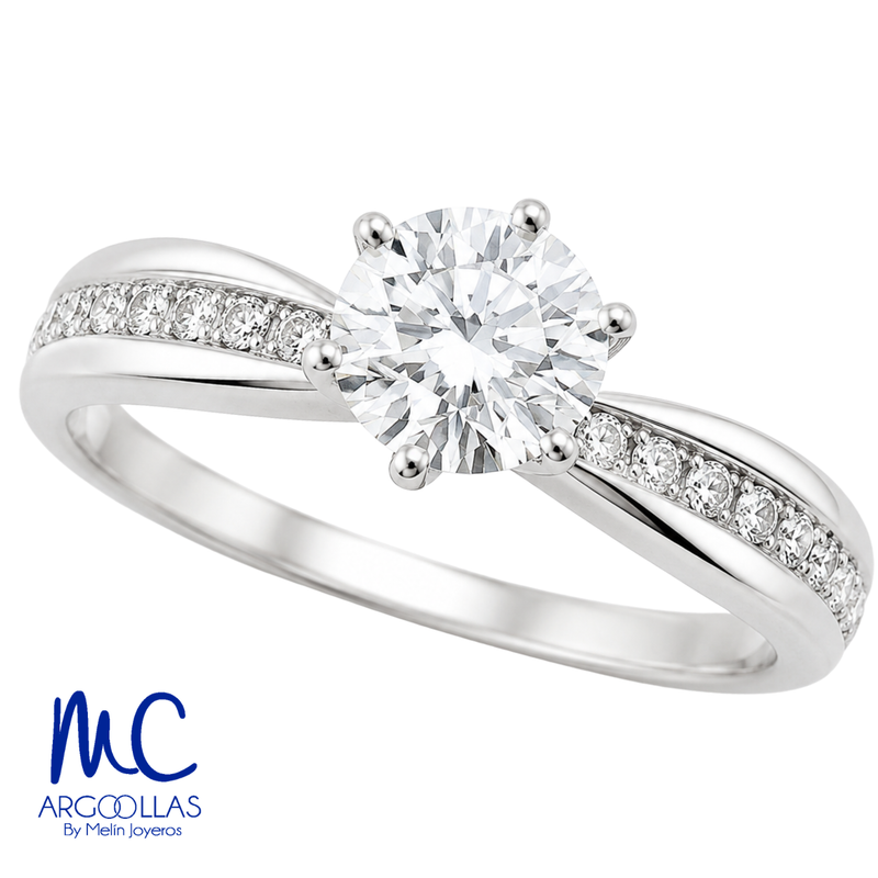 Anillo de compromiso de 0.59 ct · corte redondo brillante · color E · claridad VS1 · oro blanco 14k