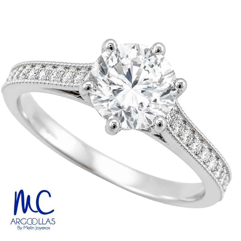 Anillo de compromiso de 1.12 ct · corte redondo brillante · color E · claridad VVS2 · oro blanco 14k