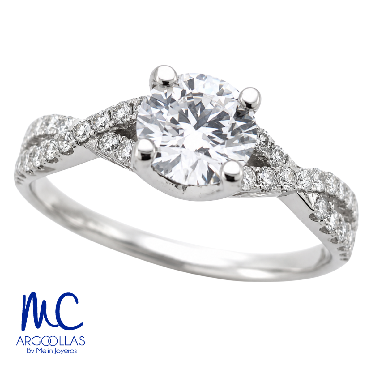 Anillo de compromiso de 0.60 ct · corte redondo brillante · color F · claridad VS1 · oro blanco 14k