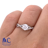 Anillo de compromiso de 0.60 ct · corte redondo brillante · color F · claridad VS1 · oro blanco 14k